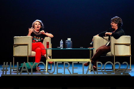 Caitlin Moran (L) speaks with Gabriela Warkentin (R) during day 3 of the 'Hay Festival Queretaro' at Teatro de la Ciudad. The Hay Festival Querétaro is a cultural and ideas festival for all audiences that celebrates the arts and sciences through inclusive, accessible and playful events.