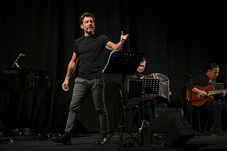 Angelo Melloni performs at the book presentation " In fin dei conti" by Angelo Melloni at Teatro Sala Umberto.