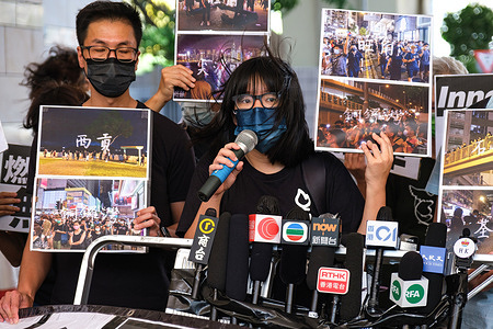 Chow Hang-tung, vice-chairperson of the Hong Kong Alliance in Support of Patriotic Democratic Movements of China speaks to the press before a court hearing.
20 pro-democracy activists appeared in West Kowloon Court for charges of organizing, inciting and participating in an unauthorized assembly over a June 4 vigil held last year.