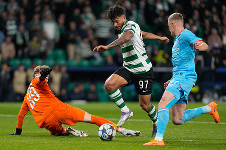 Nordin Jackers of Club Brugge KV (L), Luis Suarez of Sporting CP (C) and Hugo Siquet of Club Brugge KV (R) seen in action during UEFA Champions League 2025/26 League phase Matchday 5 between Sporting CP and Club Brugge KV at Estadio Jose Alvalade. Final score Sporting CP 3 : 0 Club Brugge KV