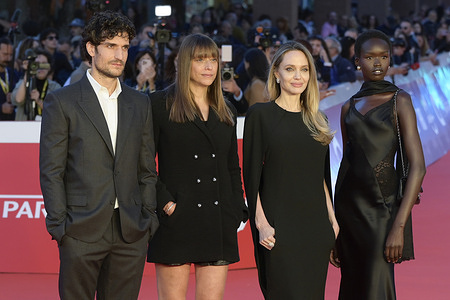 Louis Garrel (l), Alice Winocour (c), Angelina Jolie (c) and Anyer Anei (r) attend the red carpet of movie Couture during the Rome Film Fest 2025 at Auditorium Parco della Musica.