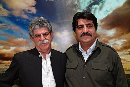 Famous Iranian-Kurdish musician Ali Akbar Moradi, and his friend Aziz Kangarlu seen performing at CandAmed Cultural Center. Famous Iranian Kurdish musician and tanbur virtuoso Ali Akbar Moradi and his friend Aziz Kangarlu performed at the 3rd Amed Kurdish Film Festival held in Diyarbakir, Turkey.