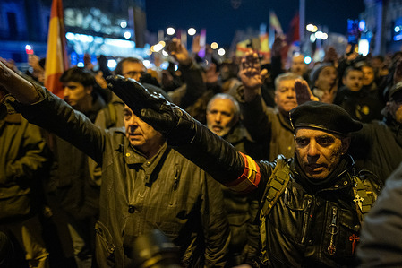 Far-right demonstrators give the fascist salute during a demonstration. The Far-right stage a demonstration called by the Falange to commemorate the anniversary of the death of the dictator Francisco Franco and José Antonio Primo de Rivera, which runs between the vicinity of the streets of Genoa and Ferraz in Madrid, where the headquarters of the People's Party (PP) and the Spanish Socialist Workers' Party (PSOE) are located.