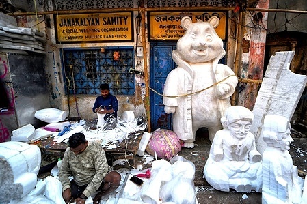 Artists make final touches to an effigy of Santa Claus before the Christmas celebration. Christmas is an annual festival commemorating the birthday of Jesus Christ celebrated on December 25 worldwide.