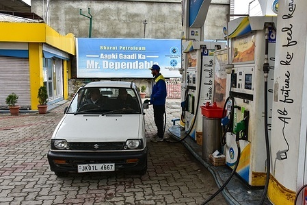 A fuel pump attendant refuels a vehicle at a fuel station in Srinagar, the summer capital of Jammu and Kashmir. India has snapped up 30 million barrels of Russian crude after the United States gave it a temporary green light, as the war in the Middle East disrupts crucial energy supplies.