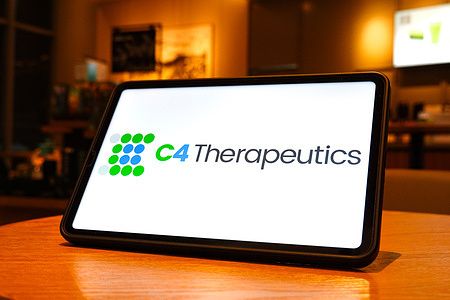 In this photo illustration, the C4 Therapeutics logo is seen displayed on the screen of a tablet.