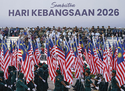 Malaysian students hold national flags during the 69th National Day celebrations parade in Putrajaya. Hari Merdeka (Independence Day) is the national day of Malaysia. It commemorates the independence of the Federation of Malaya from the British colonial rule on August 31st, 1957.