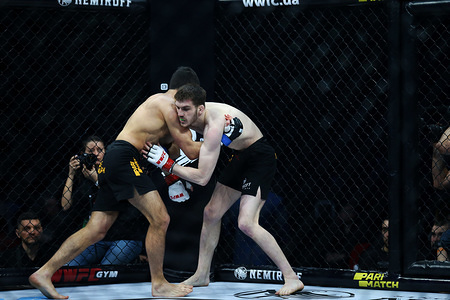Anatolii Zhurakivskyi and Arman Esayan seen in action during the WWFC 14 Match in Kiev, Ukraine.