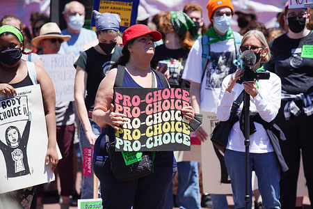 Protesters hold up placards during the rally. Hundreds of abortion supporters took the streets in San Francisco to express their voice of legal abortion and to defend Roe v. Wade to protect a pregnant woman's liberty to choose to have an abortion. They said they are against the decision of the supreme court of the United States.