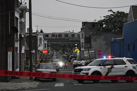 Philadelphia police investigate the crime scene that left two people shot. Two people were shot on Griscom Street and Foulkrod Street in Philadelphia, Wednesday evening at approximately 6:59 PM Eastern Time in the intersection of Griscom Street and Foulkrod Street. A 31-year-old male was shot one time in the left side of the back and is in stable condition. A 30-year-old male was shot two times in the buttocks and is in stable condition. There have been no arrests and a weapon has not been recovered.