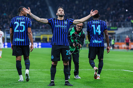 Hakan Calhanoglu of FC Internazionale celebrates after scoring a goal during Serie A 2025/26 football match between FC Internazionale and Genoa CFC at San Siro Stadium in Milan