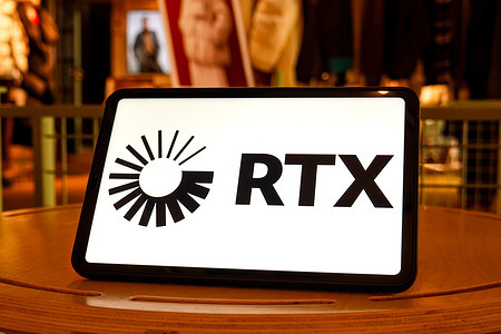 In this photo illustration, a RTX logo is seen displayed on the screen of a tablet.