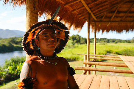 Sitting on the first floor of Mata Verde Bonita's community institute, Tup Darci Nunes is one of the leaders of this indigenous community of 180, located about fifty kilometers from Rio de Janeiro, Brazil. He opposes the construction of a luxury resort in Marica's restinga, the natural area where his indigenous village is located.