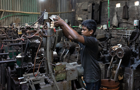 A teenage boy seen working with heavy machinery at a metal nut factory. Local metal factories that produce nuts for screws employ many workers, including underage and teenage workers. These factories fail to maintain proper safety measures, forcing employees, many of whom are minors, to work under hazardous conditions without adequate knowledge or training.