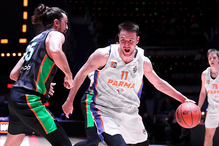 Alexey Shved (95) of UNICS and Stanislav Ilnitsky (11) of Betcity Parma, Alexey Shved (95) of UNICS in action during the Final Four WINLINE Basket Cup, 1/2 finals, basketball match between UNICS Kazan and Betcity Parma at "kck Arena". Final score; UNICS Kazan 104:83 Betcity Parma Perm.