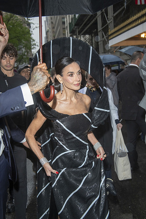 New York, United States - 05/05/2025 17:29:14: Demi Moore wearing Thom Browne departs the Pierre Hotel for 2025 Met Gala in New York City.