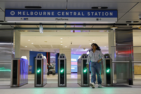 People cross the tap and go gates, which are all open for free public transport in Melbourne. One month into the United States/Israel–Iran conflict, Australia is facing rising fuel prices, supply disruptions, and increased cost-of-living pressures. In response, the Victorian Government has introduced free public transport across the state from today until the end of April to ease pressure on households and reduce fuel demand.