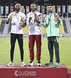 Gold medalists Mutaz Barshim (C) of Qatar and Fatak Bait Jaboob (L) of Oman, along with silver medalist Ahmed Altaruti (R) of Saudi Arabia, pose during the medal ceremony for the men’s high jump final at the 4th Gulf Cooperation Council (GCC) Athletics Championships at Suheim Bin Hamad Stadium.