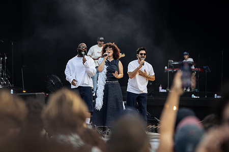 Enchantée Julia, the French singer, performs live on stage at the Rock en Seine music festival. The French singer of the soul and RnB scene Enchantée Julia performed in the second day of the Rock en Seine 2025 festival at the Domaine National Parc de Saint-Cloud, in Paris.