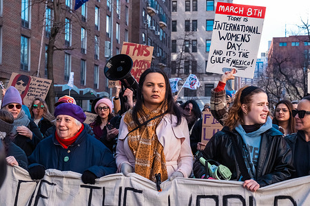 Transgender advocate Yanery Cruz leads the Women's Day March from Washington Square Park up to Union Square. One of many International Women’s Day actions held on March 8th. Protesters march form Washington Square Park up to Union Square standing in solidarity with the Trans community and the support of women’s rights currently being threatened by the Trump administration.