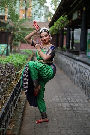Bharatanatyam exponent Srishruthi Sundarrajan, disciple of Guru Smt. Lakshmi Venkatesh poses after her Varnam recital at the Nipun Fine Arts Aadi Peruvizha held at Krishna Gana Sabha. The Varnam, Ghanam Isaithu, depicted the viraha bhakti of the nayika yearning for Lord Krishna through five significant episodes from his life like protecting Draupadi during the Vastra Haranam, blessing Kubja, subduing the serpent Kalinga, performing the Rasa Leela with the Gopikas, and imparting the Bhagavad Gita to Arjuna.