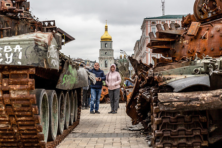 Ukrainians visit an exhibition of burnt Russian tanks on Mykhailivs'ka Square by St. Michael's Golden-Domed Monastery in Kyiv. Kyiv remains relatively peaceful as the full-scale invasion of Ukraine by the Russian forces continues and Ukrainian forces still fight Russian troops in the East of their country.