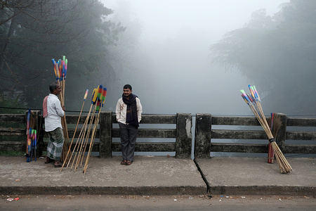 Local vendors are getting ready amid dense fog and low visibility.