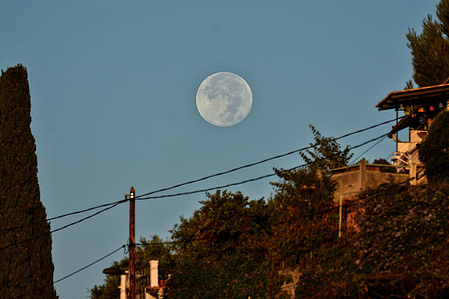 View of the Full Harvest Supermoon in Marseille. The Full Harvest Moon is the fourth and final supermoon of the year 2023.