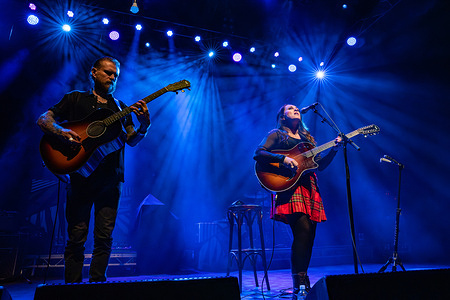 Sandi Thom seen performing live on stage with her guitarist Ben Poole. The Feeling play O2 Shepherds Bush Empire, London, UK on their 20 years of 'Twelve Stops and Home' tour, with Special guest opener Sandi Thom.
The Feeing band members are Dan Gillespie Sells, Richard Jones, Kevin Jeremiah, Ciaran Jeremiah and Paul Stewart.