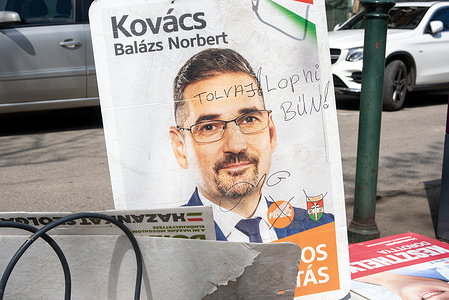 Some written thoughts added to the Fidesz election campaign poster with Norbert Balazs Kovacs on it. The thoughts say 'Thief! To steal is a sin!'. Hungary is preparing for the election on Sunday (12th April). The entire city of Budapest is covered with posters and signs. Most of the people are going to choose between the ruling party called Fidesz and the biggest opposition party called Tisza.