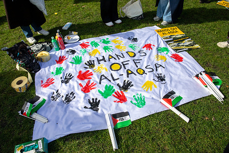 A painted banner seen during a "Hands Off Al Aqsa" demonstration in London. Following the closure of all holy sites in the Old City of Jerusalem by Israeli authorities, a demonstration took place in London. The protest was organised by a coalition of Palestinian activists who demanded full access to the Al-Aqsa Mosque and its surrounding compound. During the demonstration, participants gathered on Whitehall, where they laid out prayer mats and performed the Dhuhr prayer, the second of the five daily Islamic prayers, as a show of solidarity with worshippers affected by the restrictions.