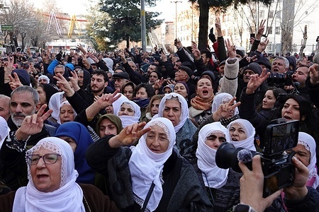 Kurdish women make the victory sign and chanting slogans during the demonstration march. In city of Diyarbakir in Turkey, Kurdish political parties and organizations wanted to protest Syrian state forces' armed attacks against the Syrian Democratic Forces (SDF) in the country's northwestern (Rojava) region. However, Turkish police dispersed thousands of people gathered in Kosuyolu Park by spraying pepper gas and rubber bullets.