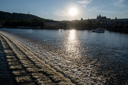 General view of Vltava river and Prague castle during sunset in Prague. Historic center of Czech capital Prague is popular tourist destination and part of UNESCO world heritage.