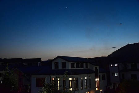 The planet Venus and planet Jupiter are seen in the evening sky during a rare Venus-Jupiter celestial meetup often nicknamed as “cosmic kiss", in Srinagar, the summer capital of Jammu and Kashmir.
