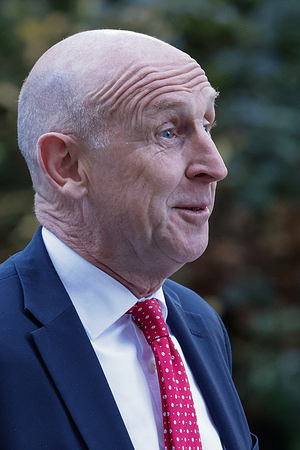 John Healey, Secretary of State for Defence seen in Downing Street.