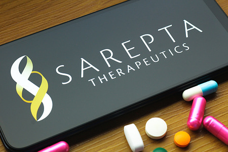In this photo illustration, the Sarepta Therapeutics logo is seen displayed on a smartphone screen.