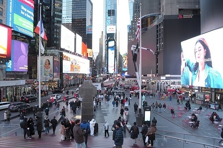 People are seen in Times Square, Manhattan, New York City.