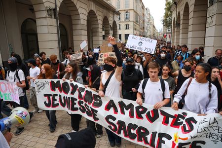 Protesters march with placards and a banner expressing their opinion during the demonstration. High school and university students took to the streets of Marseille to protest against the deteriorating educational conditions that have been affecting high schools for several years.