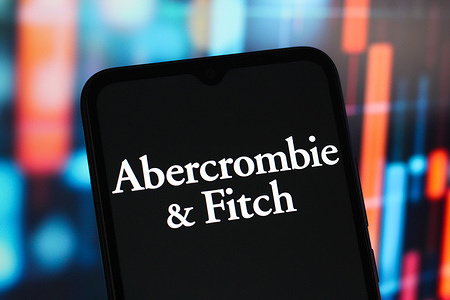 In this photo illustration, an Abercrombie & Fitch logo is seen displayed on a smartphone screen.