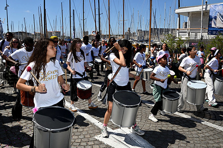 A group of dressed up musicians performs during the carnival. 36th edition of the Marseille carnival, France.