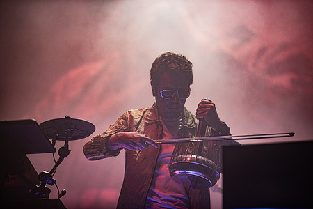 French musician and electronic music pioneer Jean-Michel Jarre performs live on stage at Piazza Roma in Modena for the Grand Finale of the Jazz Open Modena festival. The show, tour's only Italian date, fused music and technological innovation through the use of monumental lasers, artificial intelligence, and architectural mapping.