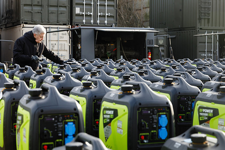 The Fifth President of Ukraine, Petro Poroshenko is seen standing amidst a massive shipment of portable electric generators destined for the Armed Forces of Ukraine, with military logistics equipment visible behind him. Former Ukrainian President Petro Poroshenko delivered 524 generators, including four German units with Deutz engines, to frontline positions of the Ukrainian Armed Forces. The equipment will power lighting, UAVs, communications, and military gear at over 520 locations. Poroshenko accused authorities of embezzling billions allocated for energy protection, claiming the crisis stems from both Russian attacks and corruption. His foundation has delivered over 5,000 generators (30 MW, valued at 120 million UAH) since the invasion began, despite facing numerous obstacles.