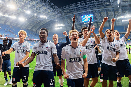 (L to R) Frederik Emmery, Stefen Tchamche, Kristian Arnstad and Mikael Anderson of Aarhus GF celebrate a win during the UEFA Champions League qualifying match between Lech Poznan and Aarhus GF at Enea Stadium Poznan. Final score: Lech Poznan lost 1: 4 to Aarhus GF with aggregate scores level 5 : 5 after the second leg. Aarhus won the penalty shoot out 4 : 3
