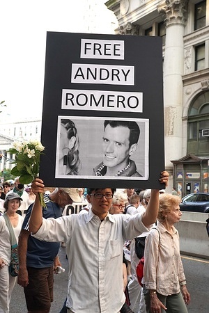 A protestor holds a placard expressing his opinion during the demonstration. Protestors Gather in Foley Square for a 'Good Trouble' demonstration March, on the late Congressman and activist John Lewis birthday.
