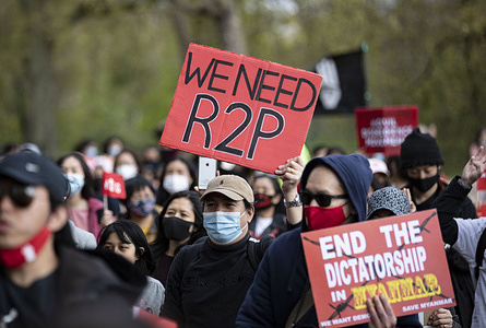 Protesters hold placards during the global Myanmar Spring Revolution in London.
18 countries, 37 cities and ground activists joined hand in hand showing solidarity with democratic protesters in Myanmar during The global Myanmar Spring Revolution. Since February 1, 2021, following a general election which was won by Aung San Suu Kyi’s National League for Democracy (NLD) party, the military seized control and has declared a year-long state of emergency. Hundreds of people, including children, have been killed. Many people been detained including the elected leader Aung San Suu Kyi and members of her NLD party.