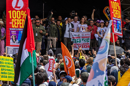 Ivan Cepeda speaks to the gathered crowd at the Bolivar Square during the Labour Day demonstration march.