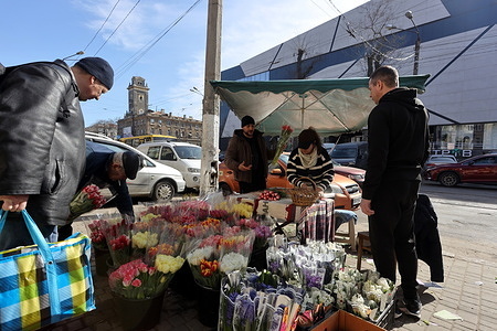 Shoppers choose flowers near the Privoz market on the occassion of International Women's Day. Flower sales on March 8 (International Women's Day) at Privoz Market. Despite Russia's ongoing military aggression, people are trying to live normal lives.
International Women's Day (IWD) is celebrated on 8 March, commemorating women's fight for equality and liberation along with the women's rights movement. International Women's Day gives focus to issues such as gender equality, reproductive rights, and violence and abuse against women