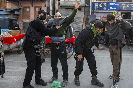 Special Operations Group (SOG) of Jammu and Kashmir police personnel frisk civilians during a random search operation ahead of India’s Republic Day in Srinagar. Authorities across Indian administered Kashmir have heightened security measures ahead of the 77th Republic Day on January 26, including intensified vehicle checks, increased patrols, and expanded surveillance using drones and high resolution CCTV cameras to monitor movement in real time. India marks Republic Day to commemorate the adoption of its constitution on January 26, 1950.