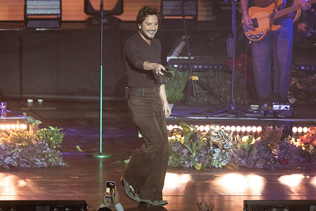 Manuel Carrasco performs at a concert during the "Christmas By Starlite" Festival at Ifema in Madrid.