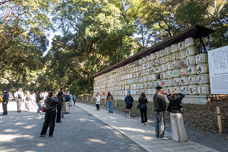 Tourists visit Sake barrels displayed at the Meiji Jingu shrine in Tokyo, Japan Meiji Jingu is a Shinto shrine in Tokyo dedicated to Emperor Meiji and Empress Shoken, set within a large forested park that feels worlds away from the city. Known for its massive torii gates and peaceful walking paths, it’s one of Tokyo’s most important spiritual sites and a popular place for traditional ceremonies and New Year visits.